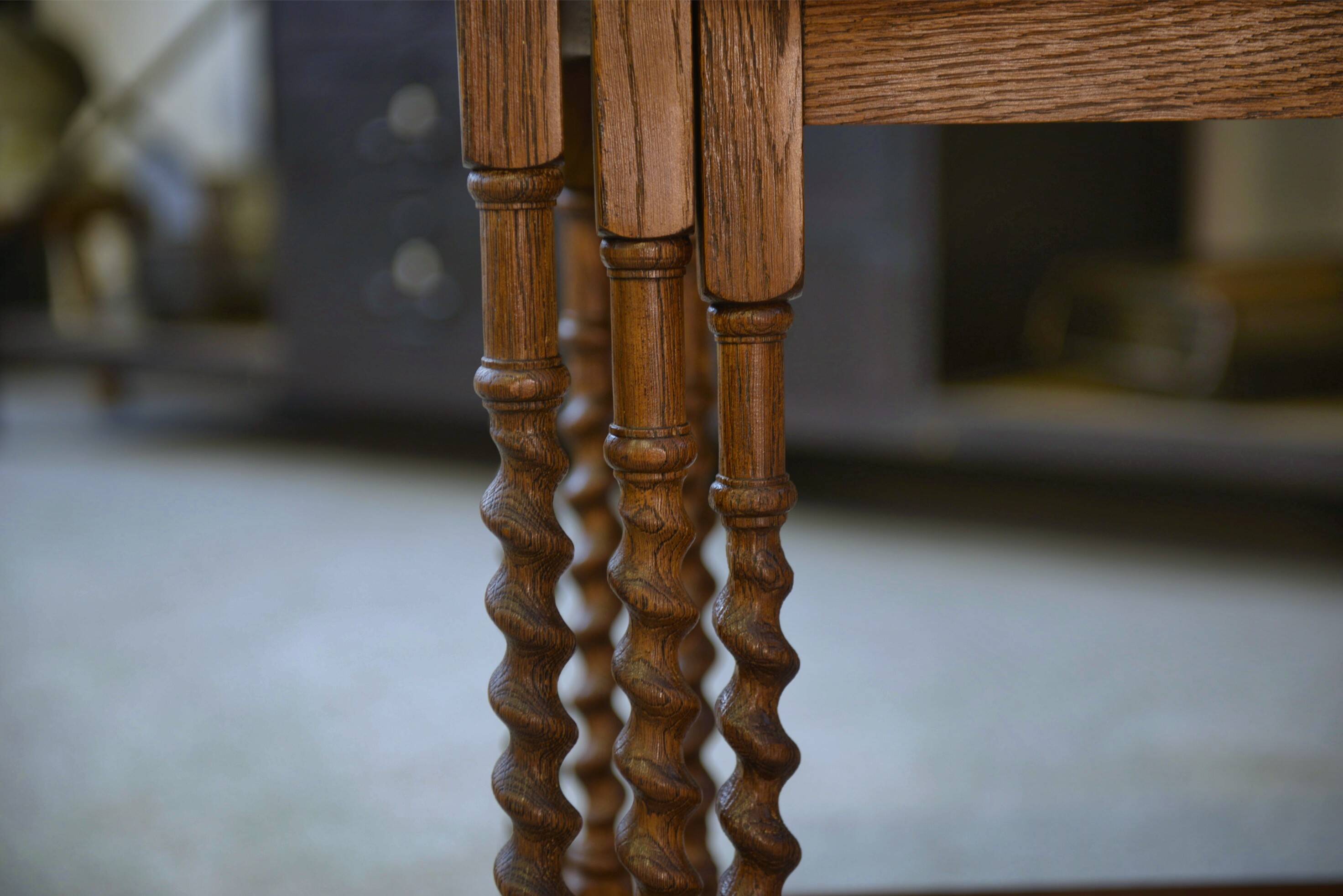 Rustic nesting tables in oak from the 1950s.