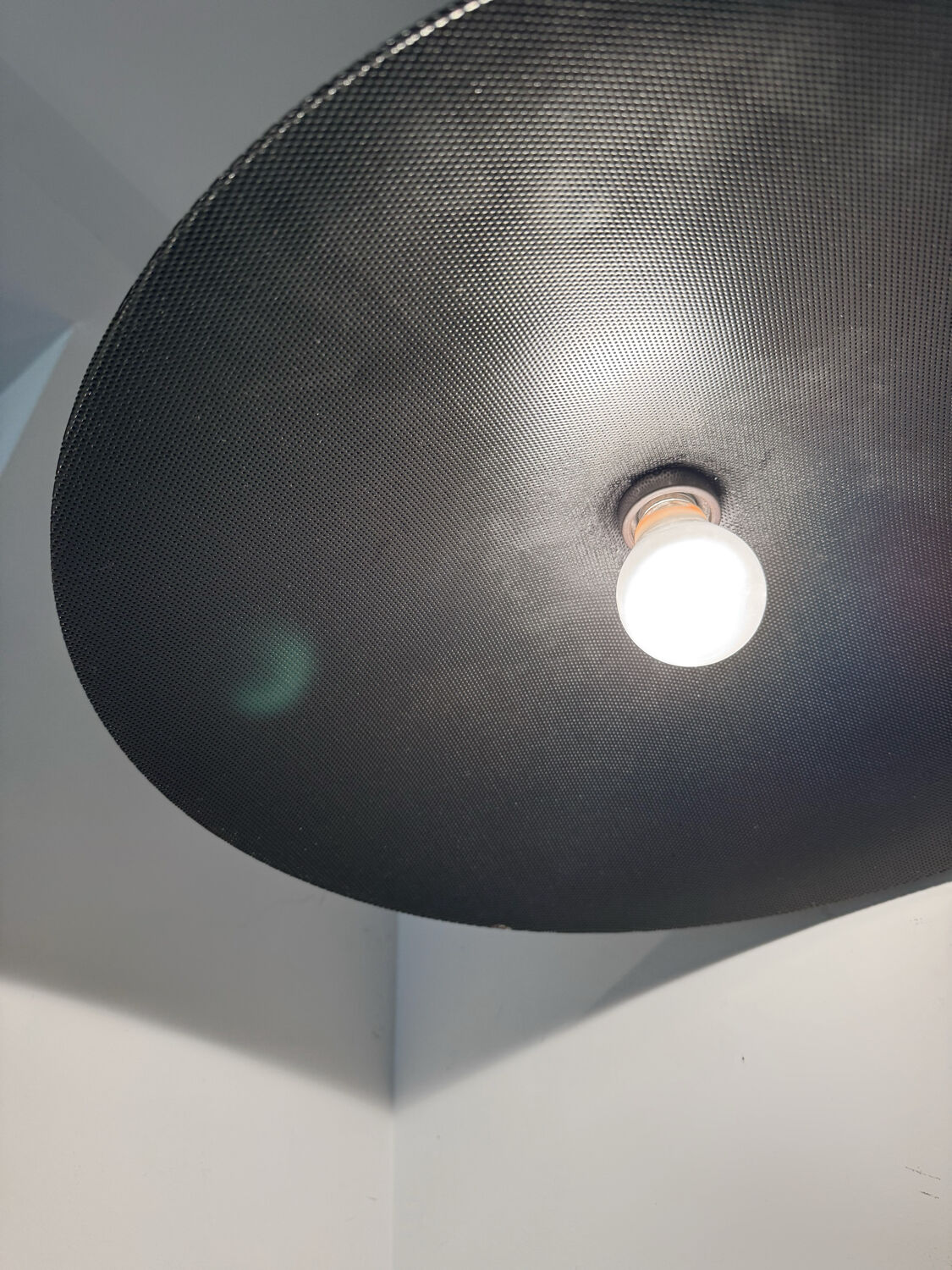 Metal micro-perforated suspension from the 1960s.