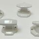 Five art deco white porcelain hooks