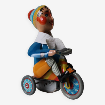 Vintage mechanical toys 'JW /Germany Western' boy on tricycle