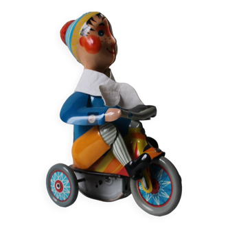 Vintage mechanical toys 'JW /Germany Western' boy on tricycle