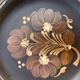 Wall plaque in black and brown ceramic, hand-painted flowers, Hungary 1970s