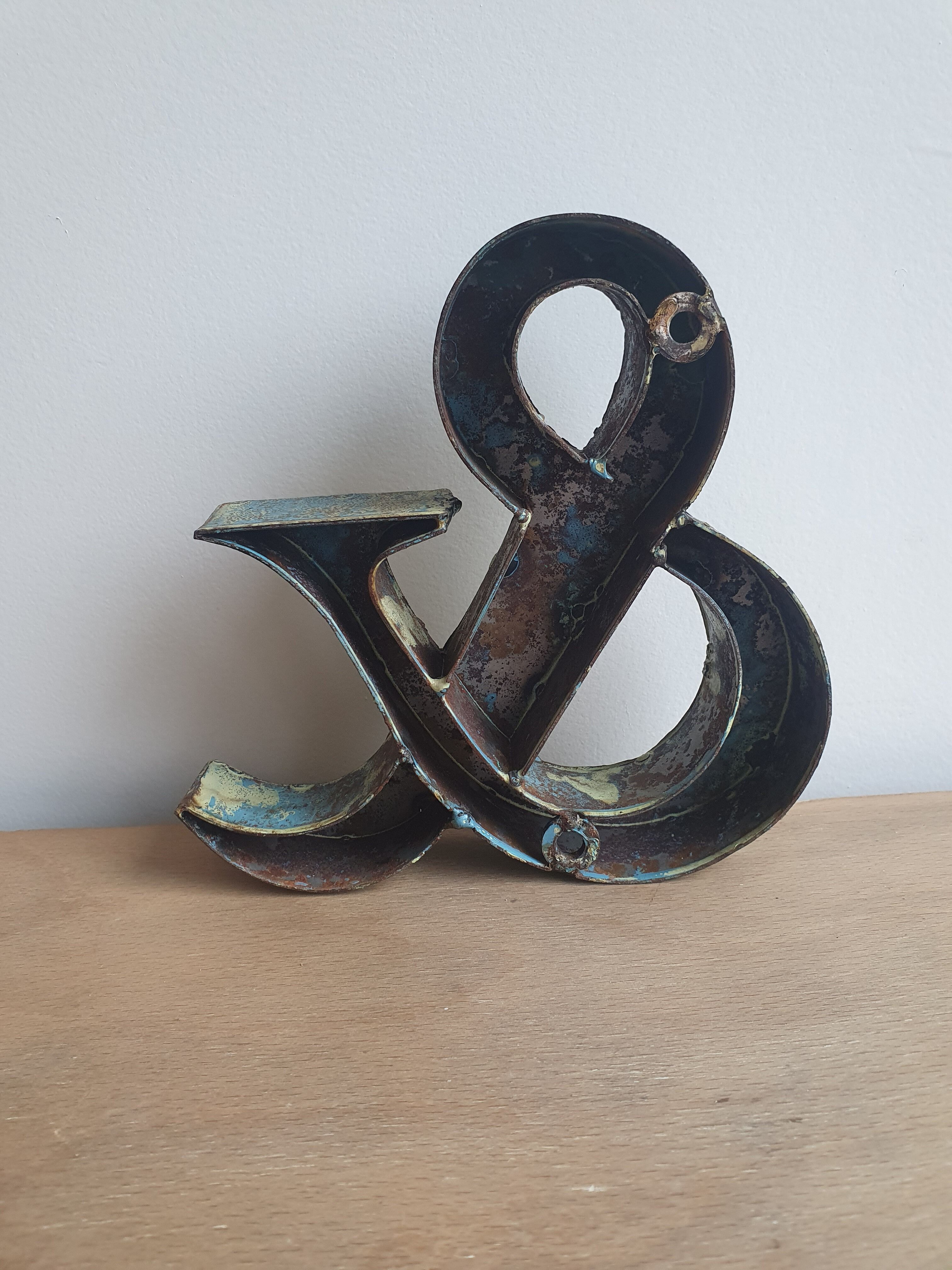 Ancient iron letter