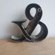 Ancient iron letter