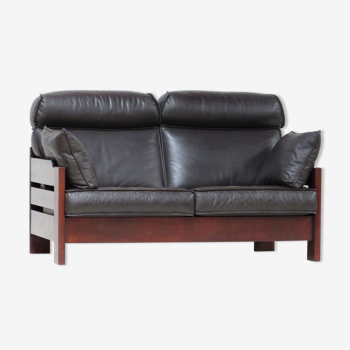 Mid century two-seater design sofa in dark brown leather
