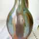 Art Nouveau style carafe in flamed stoneware with blue and brown drips