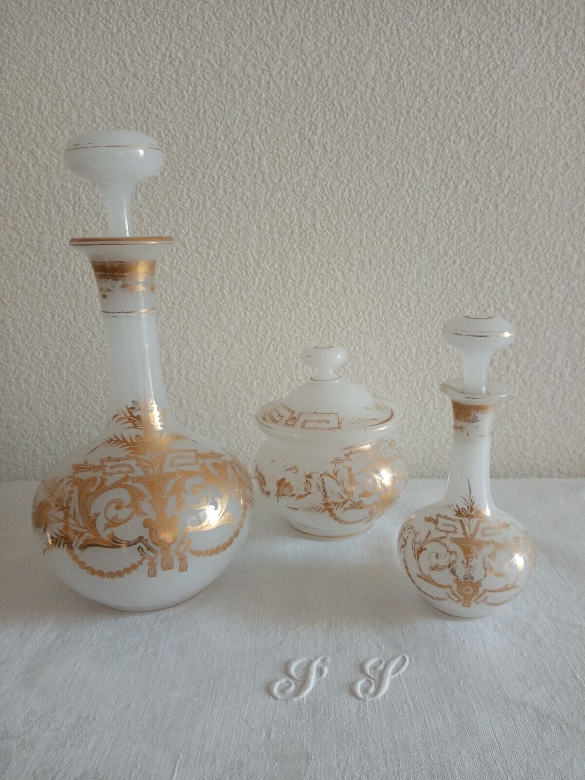Suite Carafe, Carafon and Pot Opaline with gilded decorations XIX th