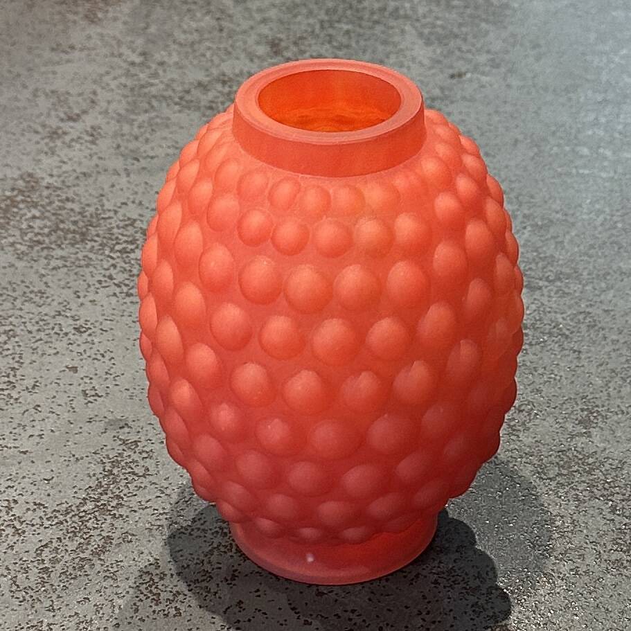 Small Art Deco ball vase in red-orange tinted glass