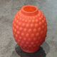 Small Art Deco ball vase in red-orange tinted glass