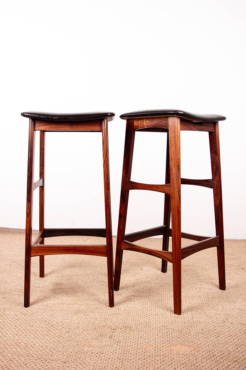 4 Danish high stools, rosewood and black leather, Knud Bent for Dyrlund.
