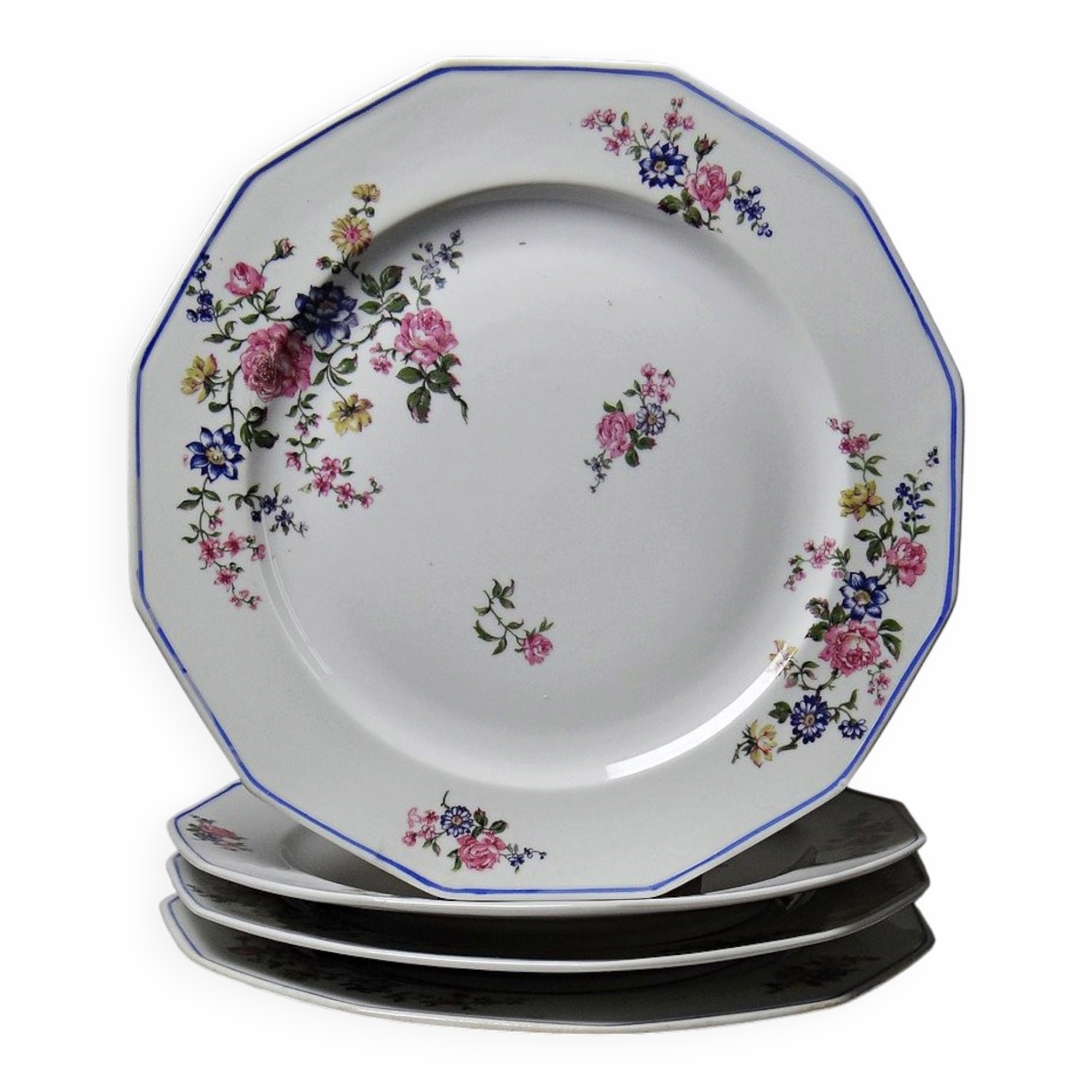 4 flat plates by Bernardaud, Limoges porcelain, floral decoration from the 1920s to 1950s.