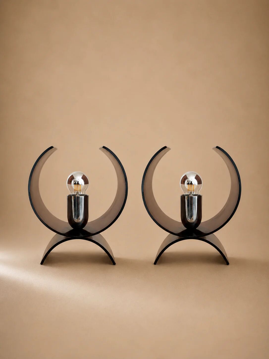 Pair of smoked brown plexiglass lamps from the 1970s.