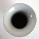 Old blue vase with vintage porcelain cherry blossoms