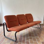 Strafor 3-seater bench, orange wool and sled base, 1970s.