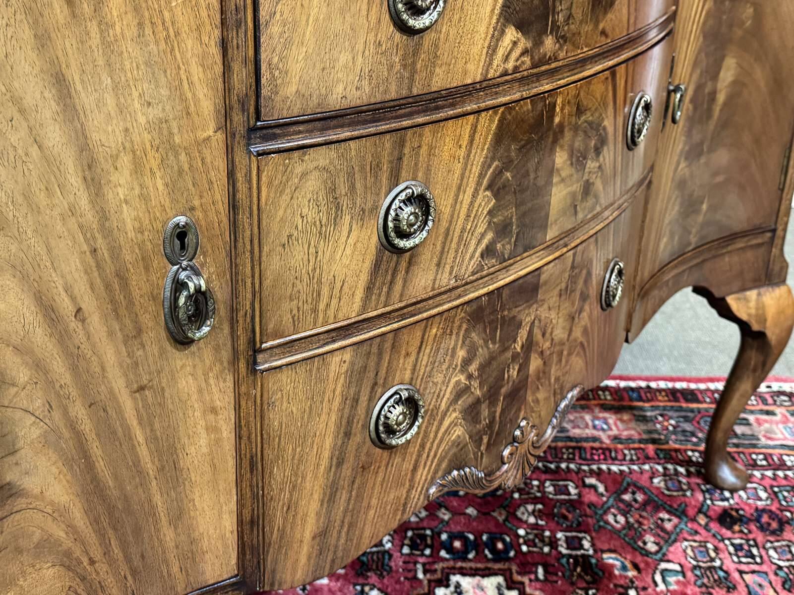 English Chippendale mahogany enfilade from the 1930s.