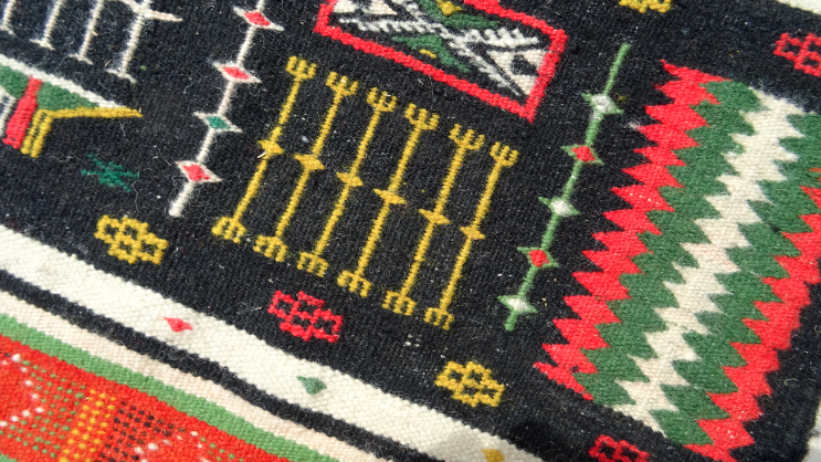 Hand woven wool rug 125x70cm