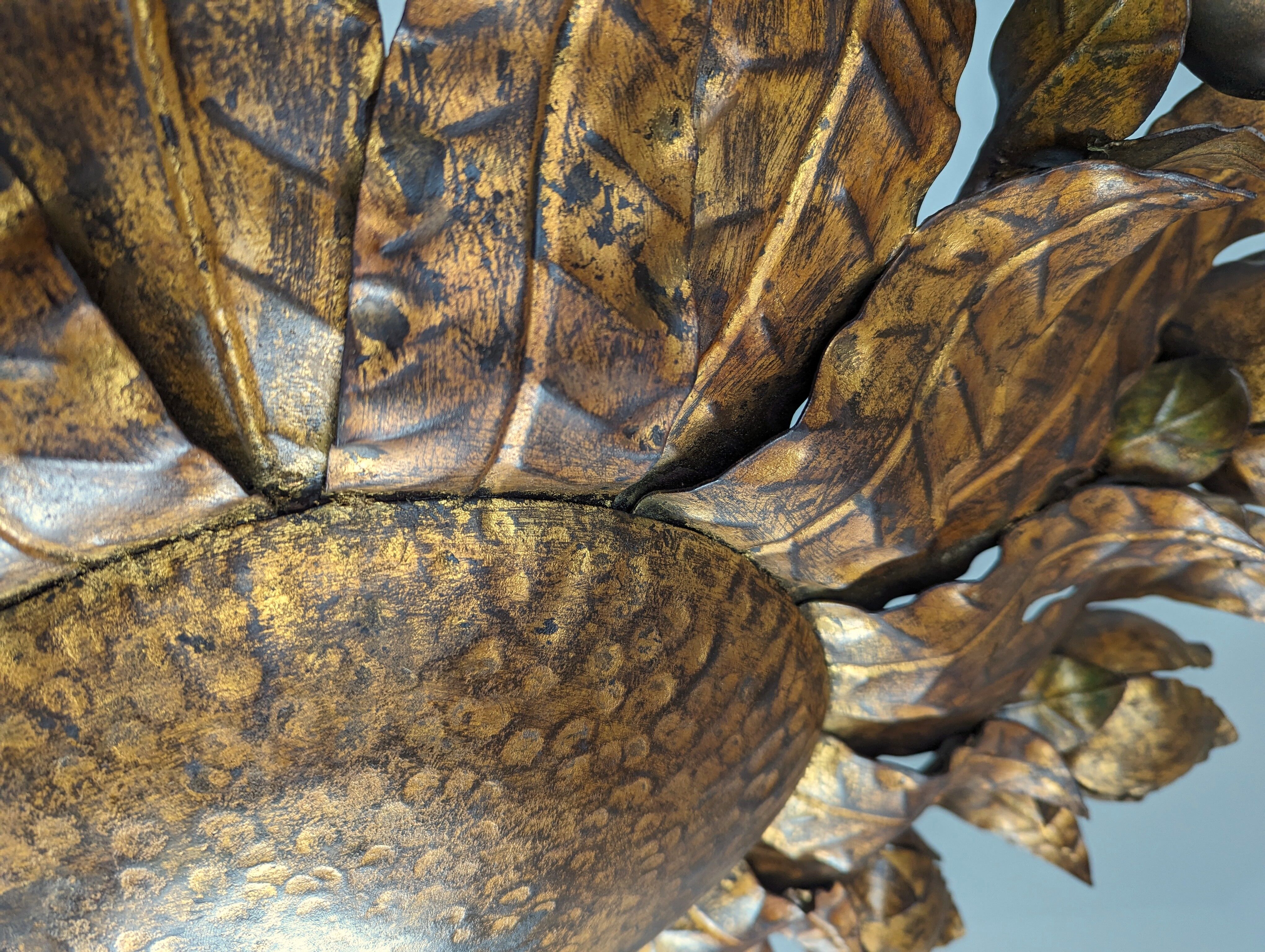 Large mid-century sunburst ceiling lamp, gilded metal with floral motif, 1950s