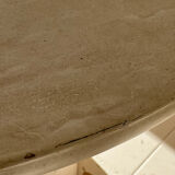 Travertine-effect stone dining table