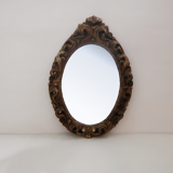 Renaissance oval mirror with bird