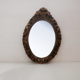 Renaissance oval mirror with bird