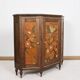 Buffet ou armoire d'angle, à 3 faces, en bois massif, sculpté et peint.
