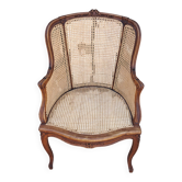 Caned armchair.