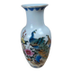 Asian vase decorated with peacock in porcelain