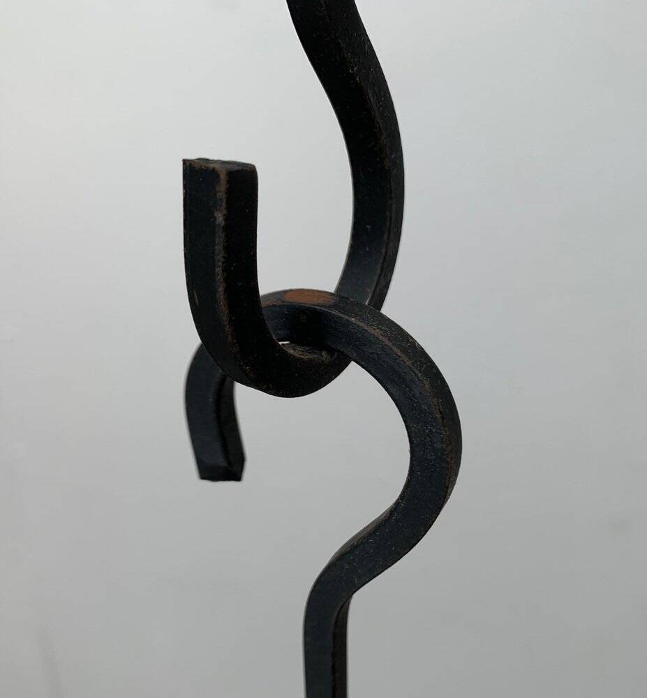 Mid-century metal and glass pendant light from the 1960s.
