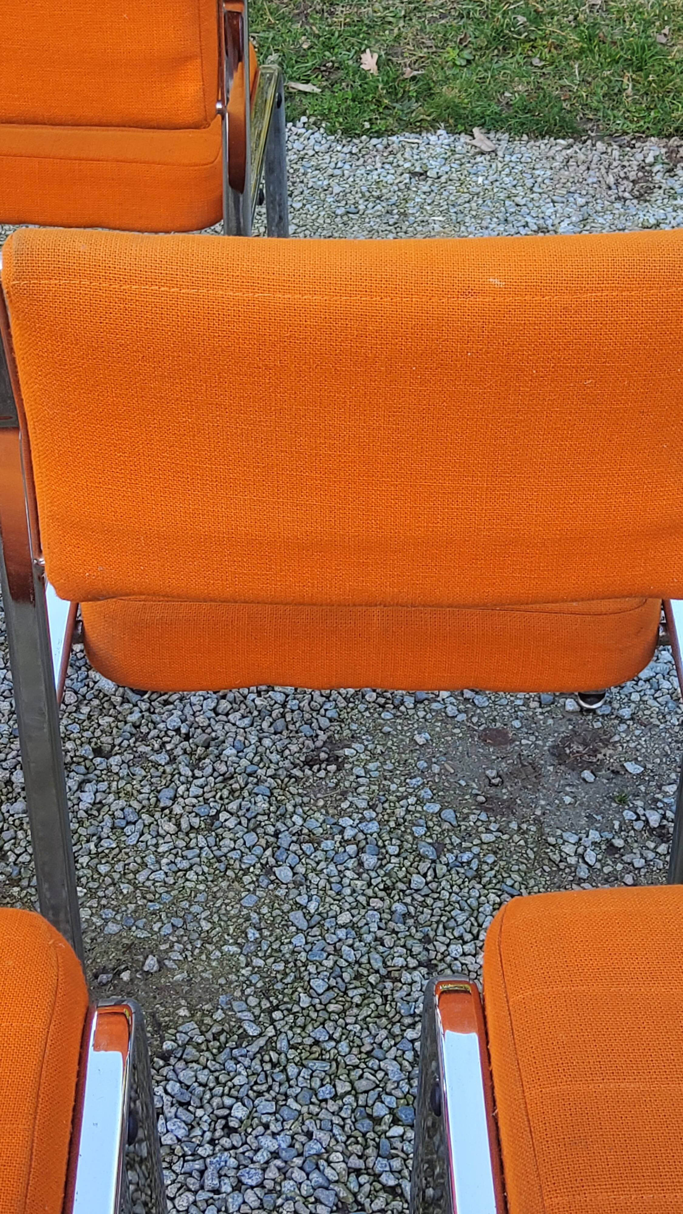 Set of 6 designer chairs from the 70s orange fabrics and chrome tubes