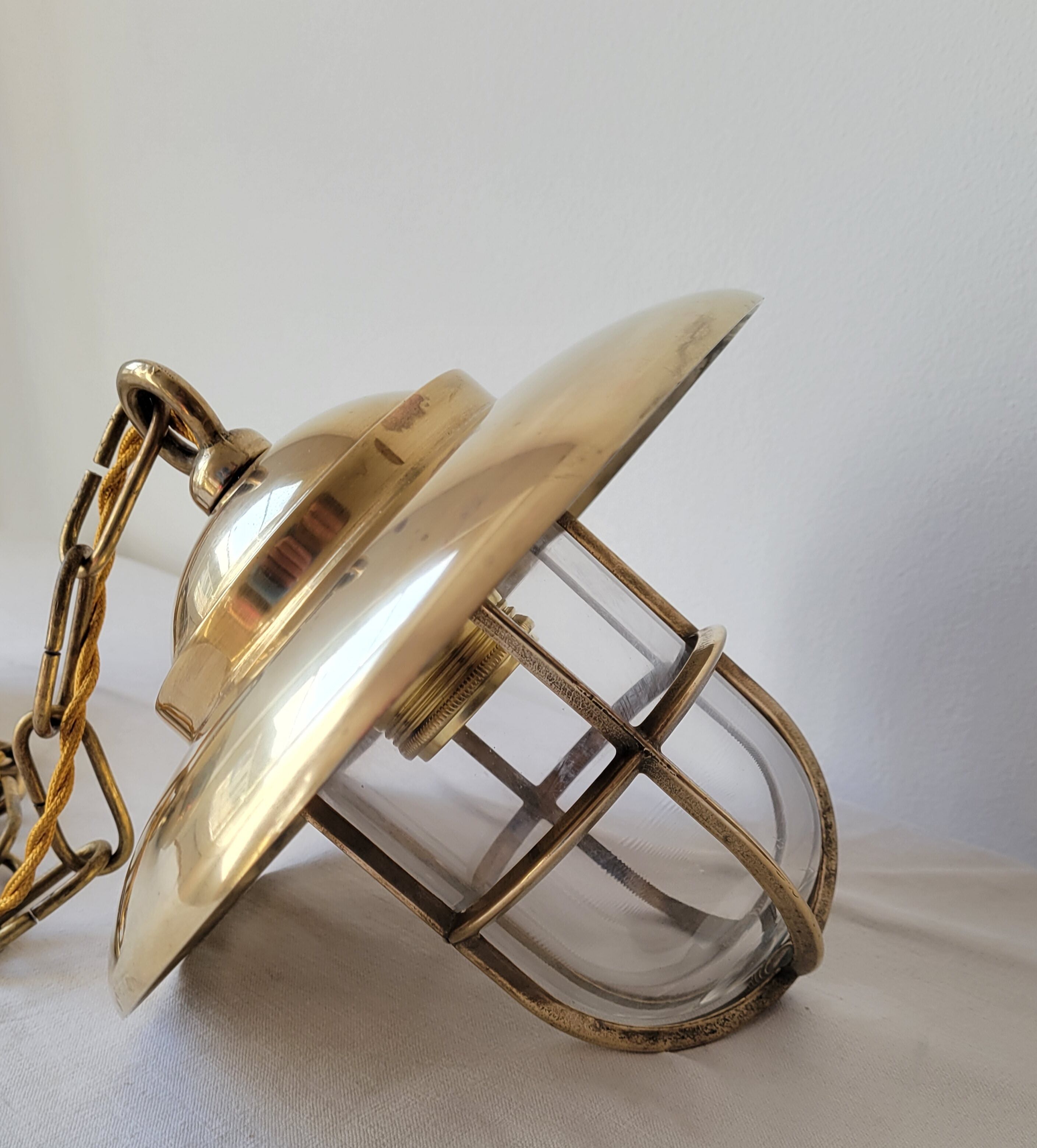 Marine suspension in brass and glass