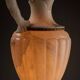 Carved alabaster urn lamp with stylized fish handle