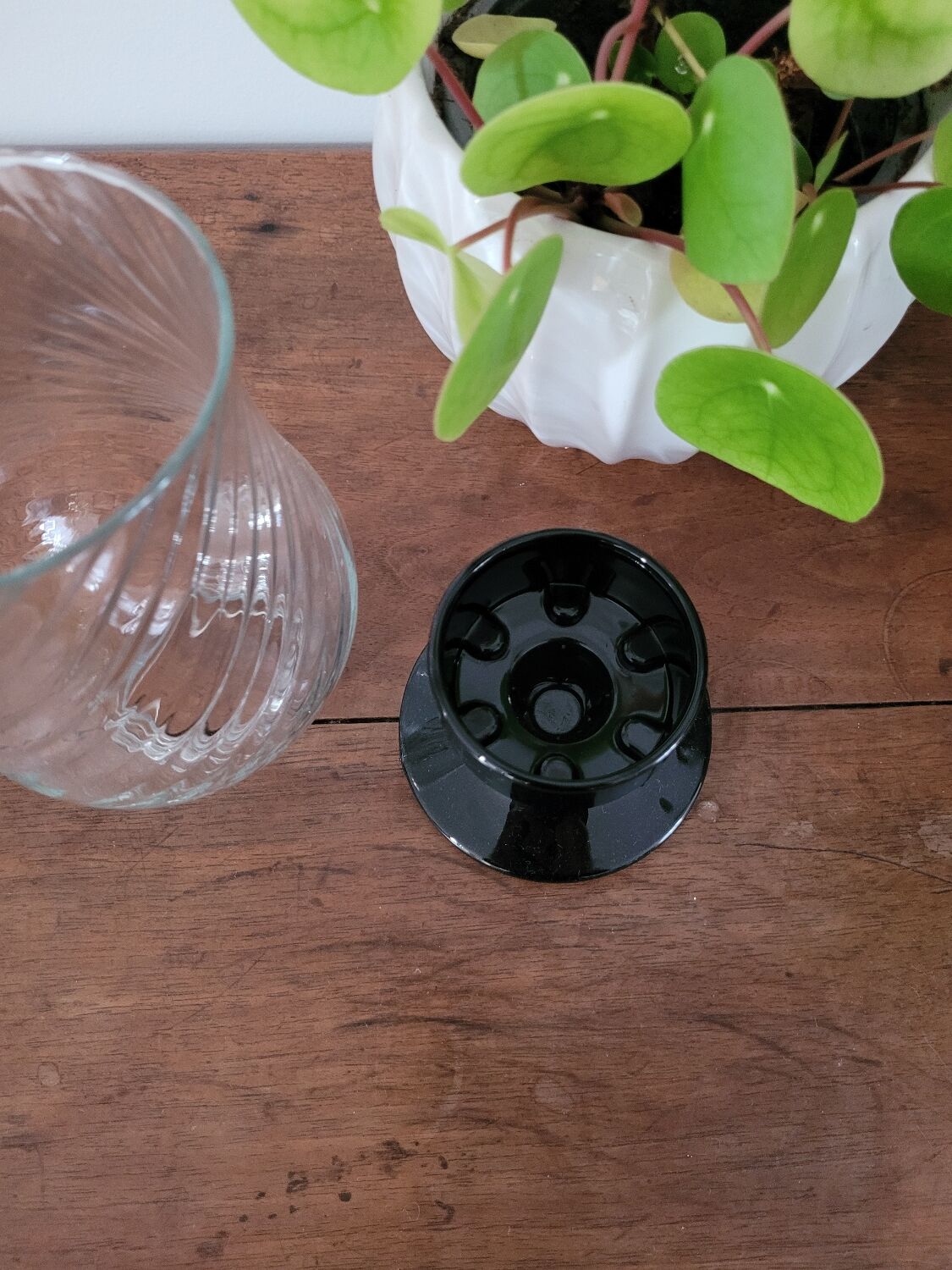 Glass candle holder with black base