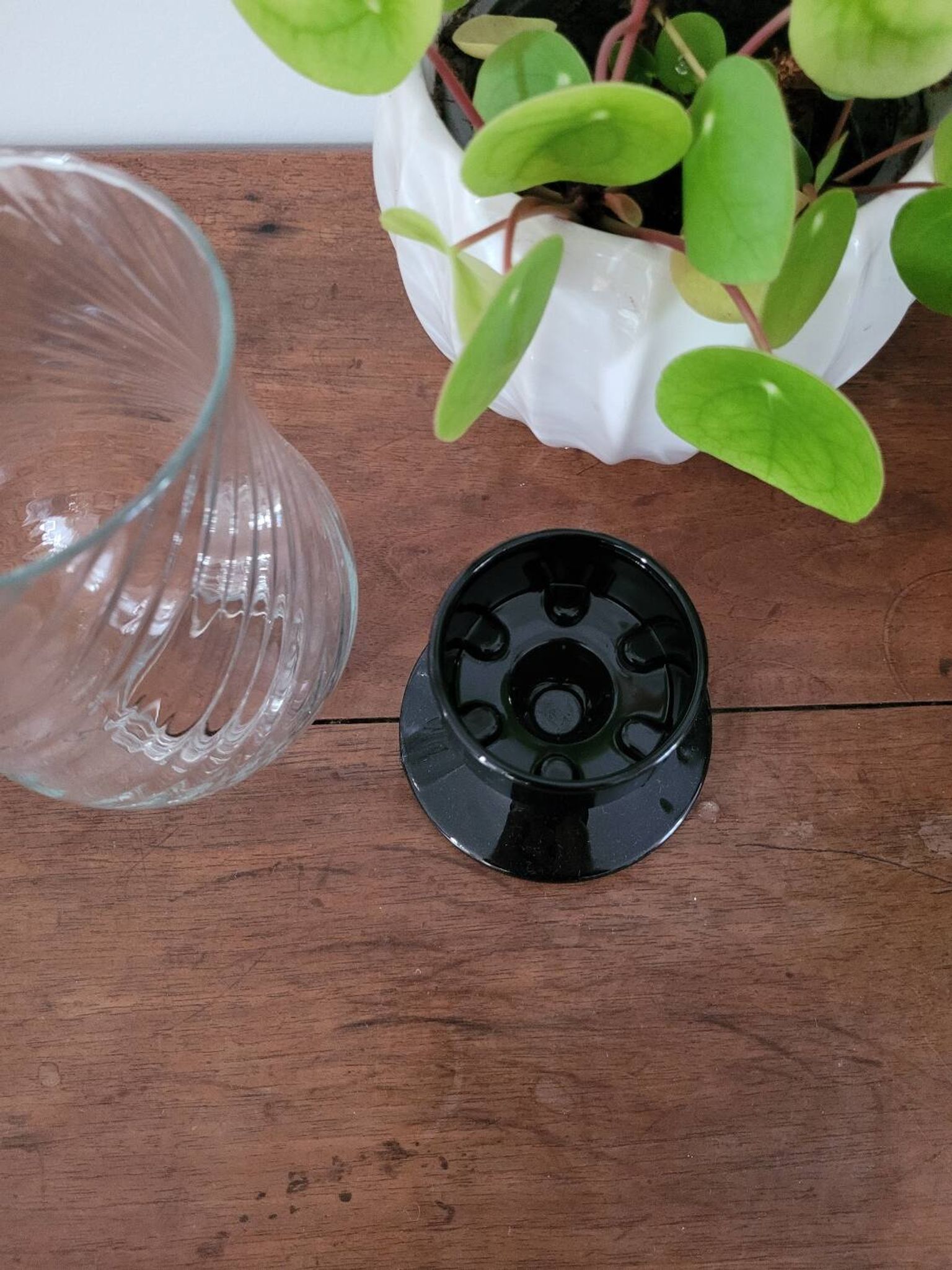 Glass candle holder with black base