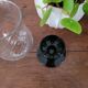 Glass candle holder with black base