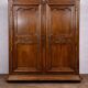 Importante armoire d’époque Louis XV, en noyer massif richement mouluré