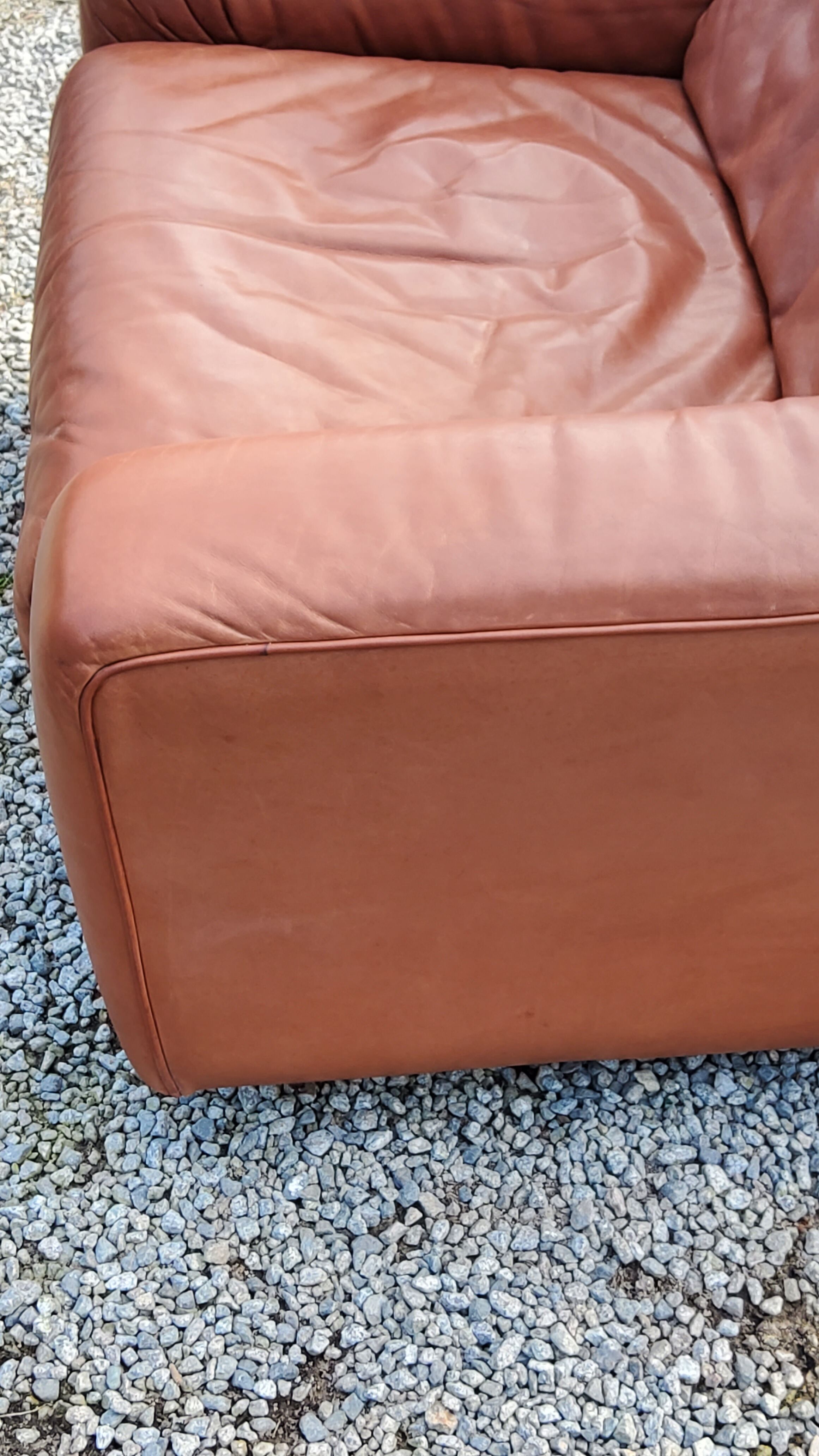 Pair of armchairs and De Sede sofa in cognac leather from the 70s/80s