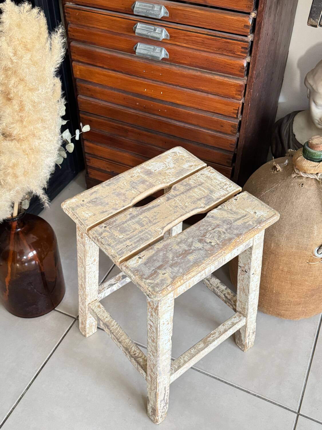 Old wooden stool with square seat
