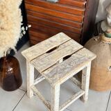 Old wooden stool with square seat