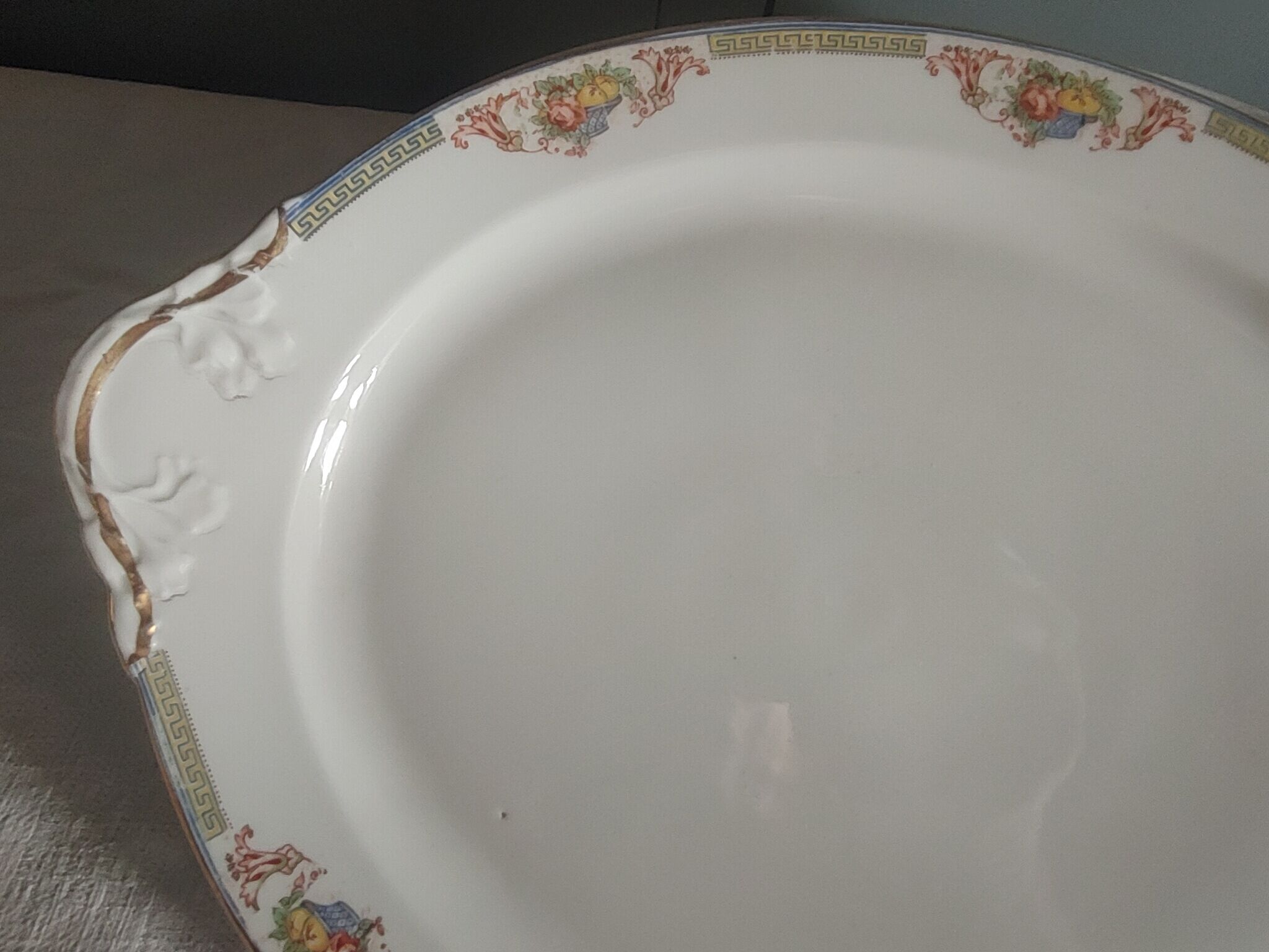 Large serving dish in Limoges porcelain Flower baskets, fruit - early 20th