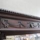 Imposing beveled mirror with wooden frame