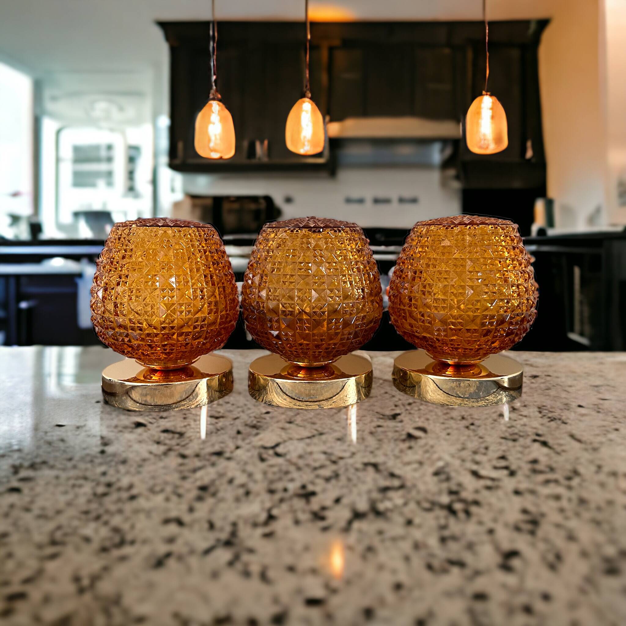 Set of three vintage wall or ceiling lights in amber chiseled glass