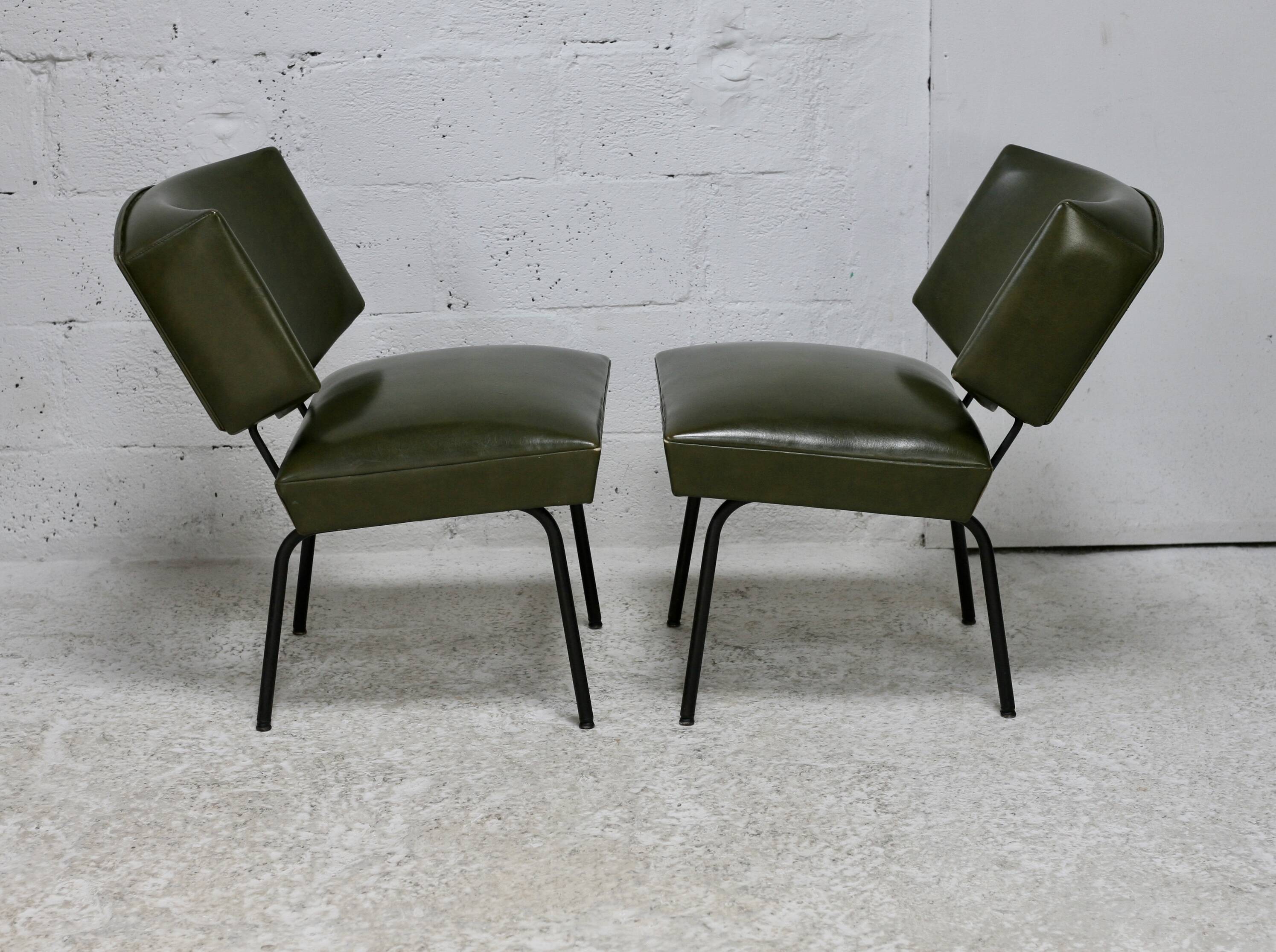 Pair of tubular armchairs, imitation leather. Circa 1950