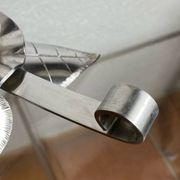 Silver-plated metal flower candle holder