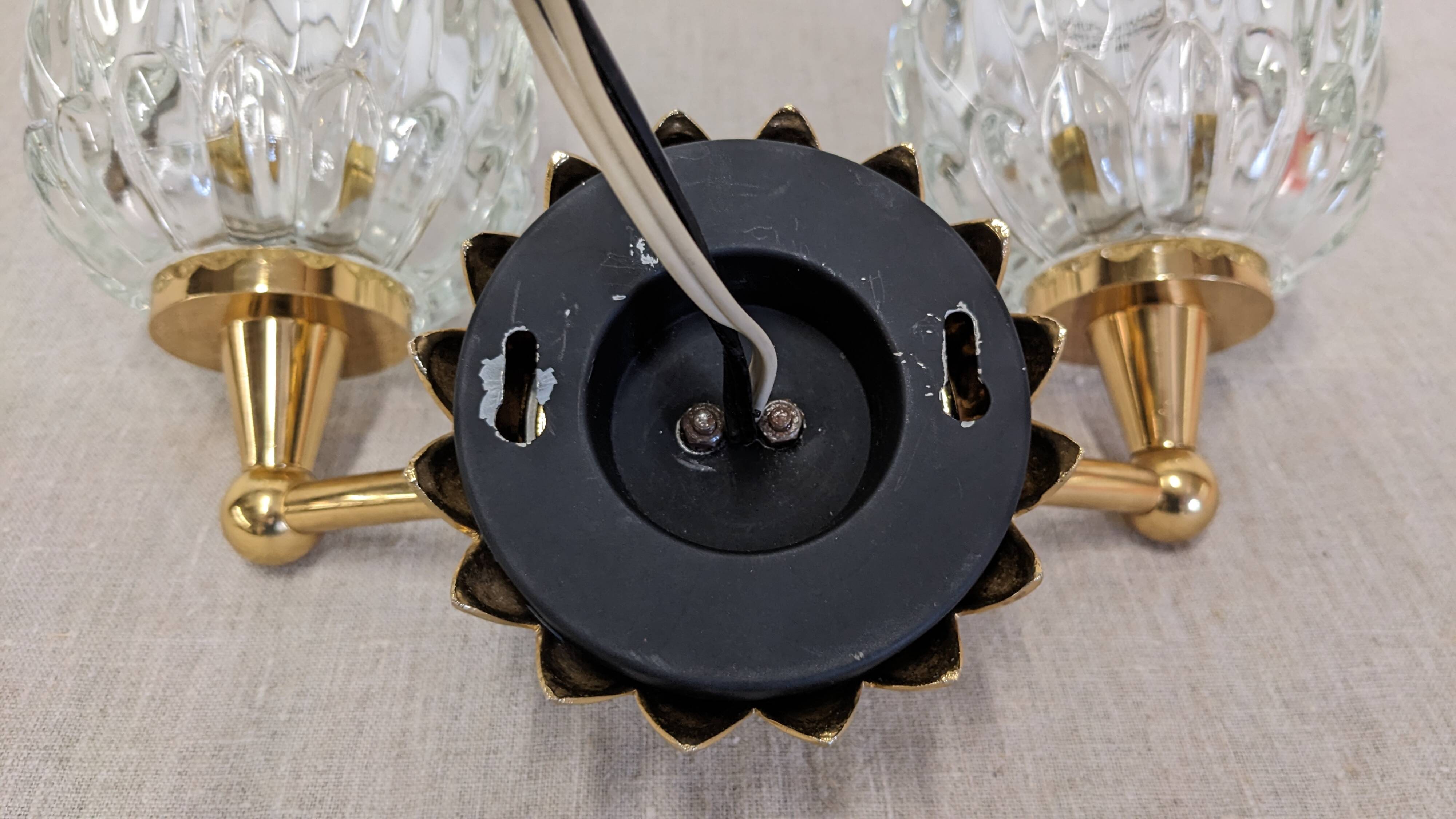Set of 4 modernist double wall lights by Maison Arlus, France circa 1950.