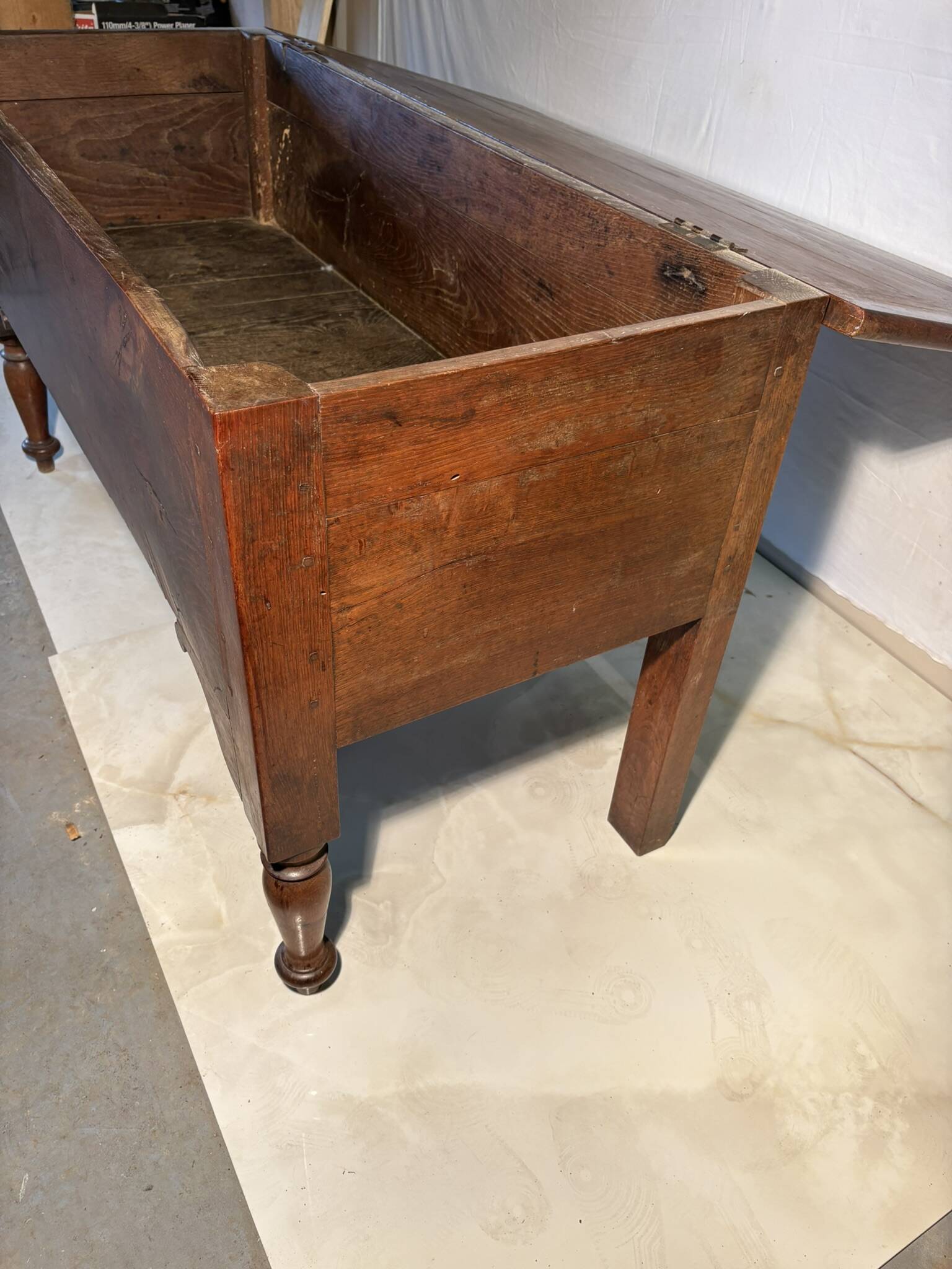 Large antique oak chest with turned legs