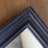 19th century blackened mirror with pitted glass 34cm x 40cm