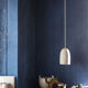 Speckled white ceramic suspended light fixture