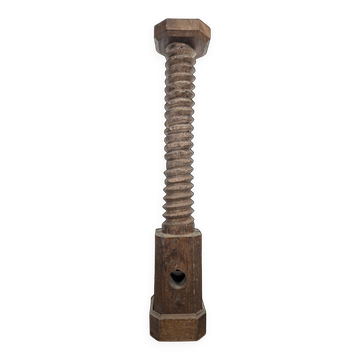 Large press screw stool in oak with an octagonal top.