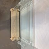 Hollywood Regency console style in travertine, glass, and Lucite.