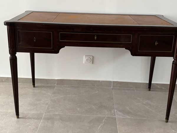 Bureau style Empire en acajou et cuir doré